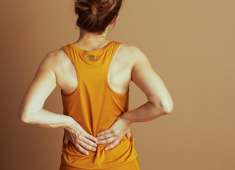 Woman experiencing lower back pain